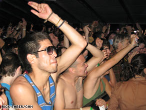 Festival attendees enjoy the music Saturday, Day Two of the Coachella music festival in Indio, California.