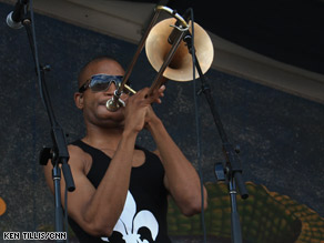 Troy "Trombone Shorty" Andrews performs on the Gentilly stage at the New Orleans Jazz Festival.