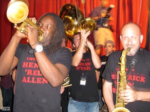 Shamarr Allen, Mark Mullins and Ben Ellman sport the Midnite Disturbers T-shirts as they perform.