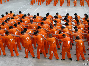 The prisoners performed in searing heat Saturday.