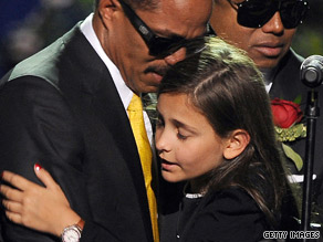 Jermaine Jackson sings his brother's favorite song, "Smile," in front of the "King of Pop's" casket.