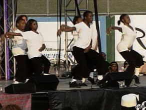 A group pays tribute to Michael Jackson by performing some of his signature moves.