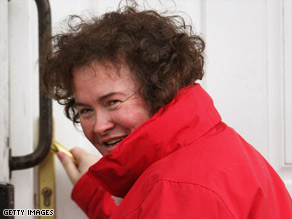 Overnight sensation Susan Boyle enters her home in West Lothian, Scotland, on May 8.