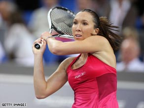 Jelena Jankovic was taken to three sets again before securing her last four place in Paris Indoor event.