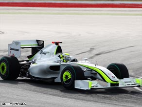 Jenson Button mastered the wet conditions at Sepang, leading the field when the race was abandoned.