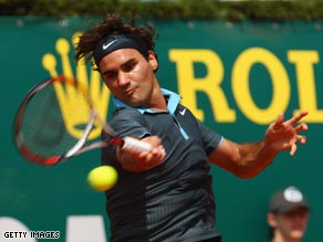 Federer powers a forehand during his straight sets win of Andrea Seppi in Monte Carlo