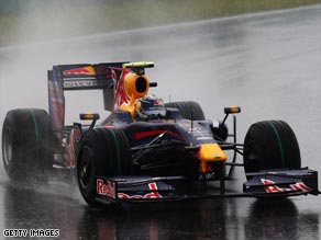 Sebastian Vettel mastered the testing conditions to give Red Bull their first grand prix victory in Shanghai.