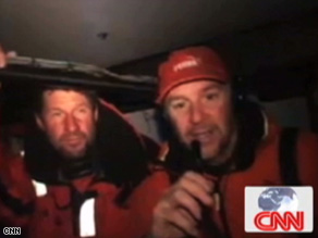 Jerry Kirby (l) and Ken Read (r) speak with CNN from aboard the Puma Racing Volvo Ocean Race boat