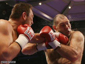 Ruslan Chagaev (left) lands a powerful left-hander during his win over Nikolai Valuev two years ago.