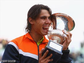 Rafael Nadal in familiar pose after winning the Rome Masters for his fifth tournament victory of the season.