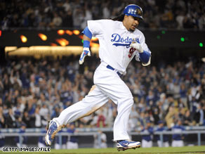 Manny Ramirez hits a home run for a 4-3 lead against the San Diego Padres on April 30 in Los Angeles, California.