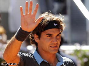 Federer acknowledges the crowd after stunning Rafael Nadal in straight sets in the Madrid Masters final.