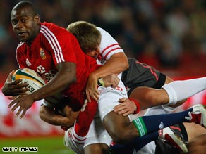 Ugo Monye scored two tries as the British and Irish Lions recorded an emphatic victory in South Africa.