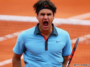 Roger Federer screams in joy after beating Juan Martin del Potro to reach the French Open final.