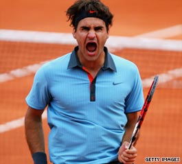 Roger Federer screams in joy after beating Juan Martin del Potro to reach the French Open final.