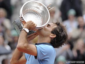 Federer is the French Open champion at last after beating Robin Soderling in straight sets at Roland Garros.