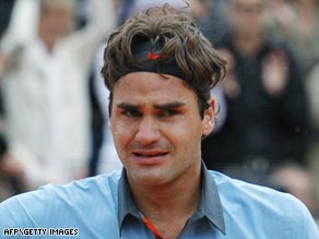 Roger Federer quits the Halle Open saying he is  "overwhelmed and exhausted" after his Paris triumph.