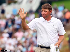 Glover celebrates claiming his first major title by two shots from a trio of chasers.