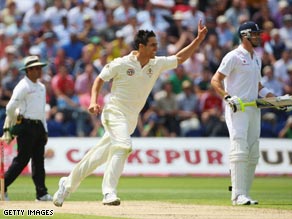 Flintoff trudges off after being dismissed late in the day by Siddle.