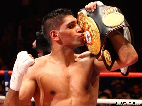 Khan is a world champion for the first time after his impressive victory over Andreas Kotelnik.