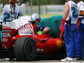 Felipe Massa receives attention after his high-speed crash in Hungarian Grand Prix qualifying.