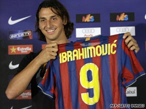 Ibrahimovic displays his new Barcleona shirt after completing his transfer from Inter Milan.