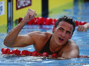 Lochte celebrates victory as Michael Phelps finally loses his men's 200-meter medley world record.