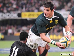 Springboks hero Morne Steyn breaks through the tackle of All Blacks winger Sitiveni Sivivatu.