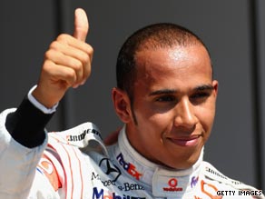 Hamilton gives the thumbs up after taking pole position for Sunday's European Grand Prix.
