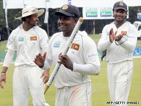 Herath claims a souvenir after his five-wicket haul ensured Sri Lanka won the second Test in Colombo.