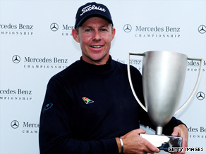 James Kingston shows off his trophy after winning a playoff to claim the Mercedes-Benz Championship.