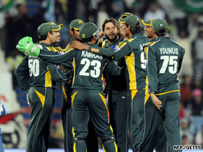 Shahid Afridi is congratulated after claiming a wicket in the Pakistan win.