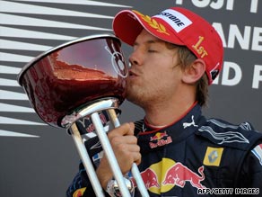 Sebastian Vettel's third F1 victory of the season keeps alive his faint world title hopes with two races left.