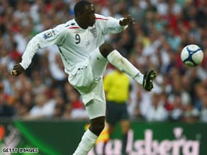 Heskey has been re-united with former manager Martin O'Neill after signing for Aston Villa.