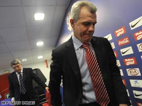 Mexican Javier Aguirre leaves his farewell Atletico media briefing followed by club president Enrique Cerezo.