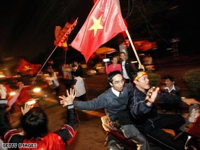 Celebration time: Five people were killed on Vietnamese roads as football joy got out of control.