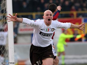 Esteban Cambiasso celebrates his opening goal in Inter Milan's 2-1 victory at Bologna.
