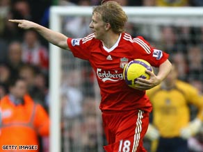 Dirk Kuyt rescued a draw for Liverpool on Sunday, but they now trail Manchester United by seven points.