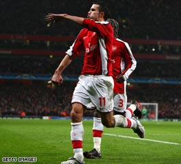 Van Persie celebrates the goal that gives Arsenal a slender Champions League lead going to Italy.