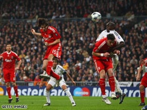 Benayoun (15) heads home the only goal as Liverpool claimed a superb 1-0 victory at the Bernabeu.