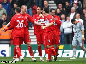 Middlesbrough players celebrate their opening goal at the Riverside against Liverpool.
