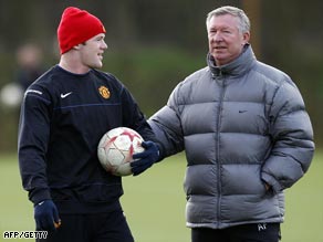 Rooney (left) and Ferguson pictured at United's Carrington training ground.