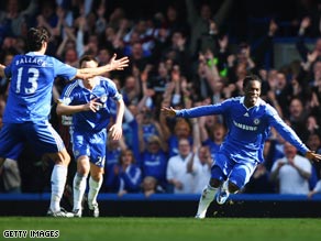 Michael Essien (right) celebrates his goal as Chelsea beat Manchester City to go second in the Premier League.