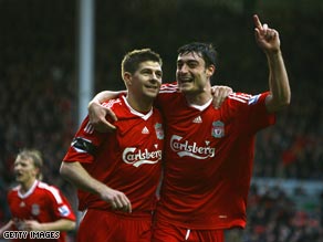 Gerrard (left) and Riera enjoyed superb afternoons at Anfield as Villa were routed.