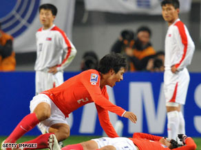 South Korea's Oh Beom-Seok, left, celebrates with Kim Chi-Woo after Kim's late goal Wednesday in Seoul.