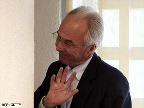 Eriksson waves farewell after the press conference announcing he was stepping down.