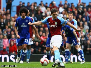 Gareth Barry fires home Aston Villa's equalizer in their thrilling 3-3 draw with Everton on Sunday.