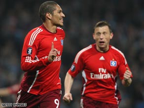 Paolo Guerrero (left) celebrates the goal that ensured Hamburg reached the semifinals of the UEFA Cup.
