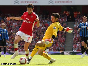 Cesc Fabregas rounds goalkeeper Brad Jones for Arsenal's second goal in their 2-0 victory over Middlesbrough.