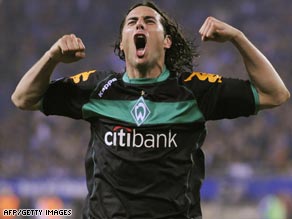 Claudio Pizarro celebrates scoring Werder's second goal in their thrilling 3-2 victory over Hamburg.